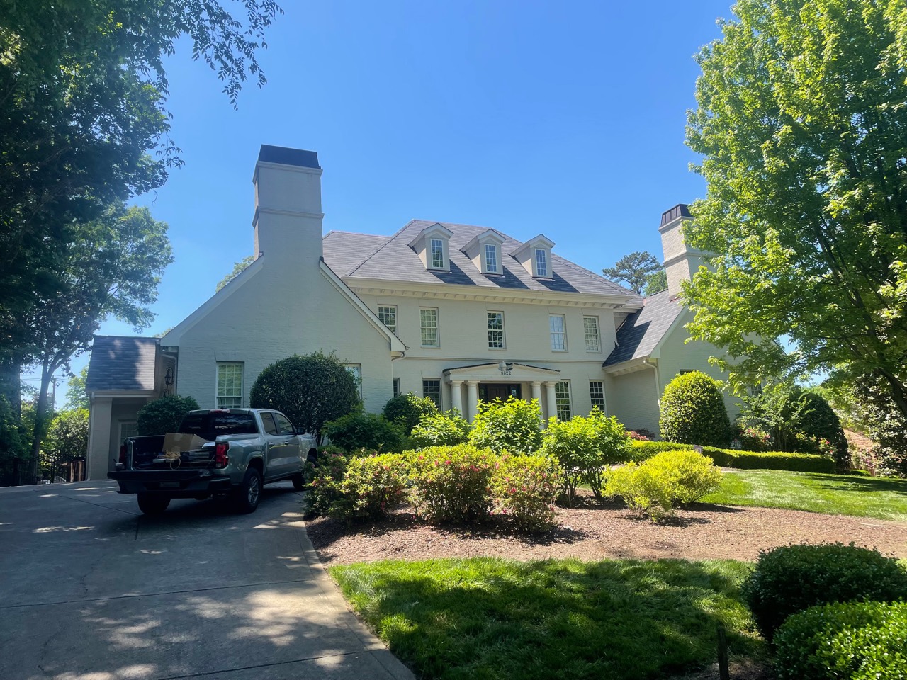 Front view of the completed English Gray designer shingle roof